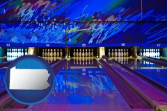 pennsylvania map icon and a bowling alley with an abstract wall mural