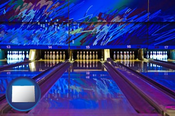 a bowling alley with an abstract wall mural - with Colorado icon