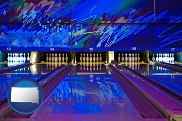 a bowling alley with an abstract wall mural - with South Dakota icon